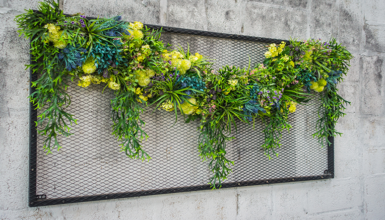 screen of plants on wall.jpg