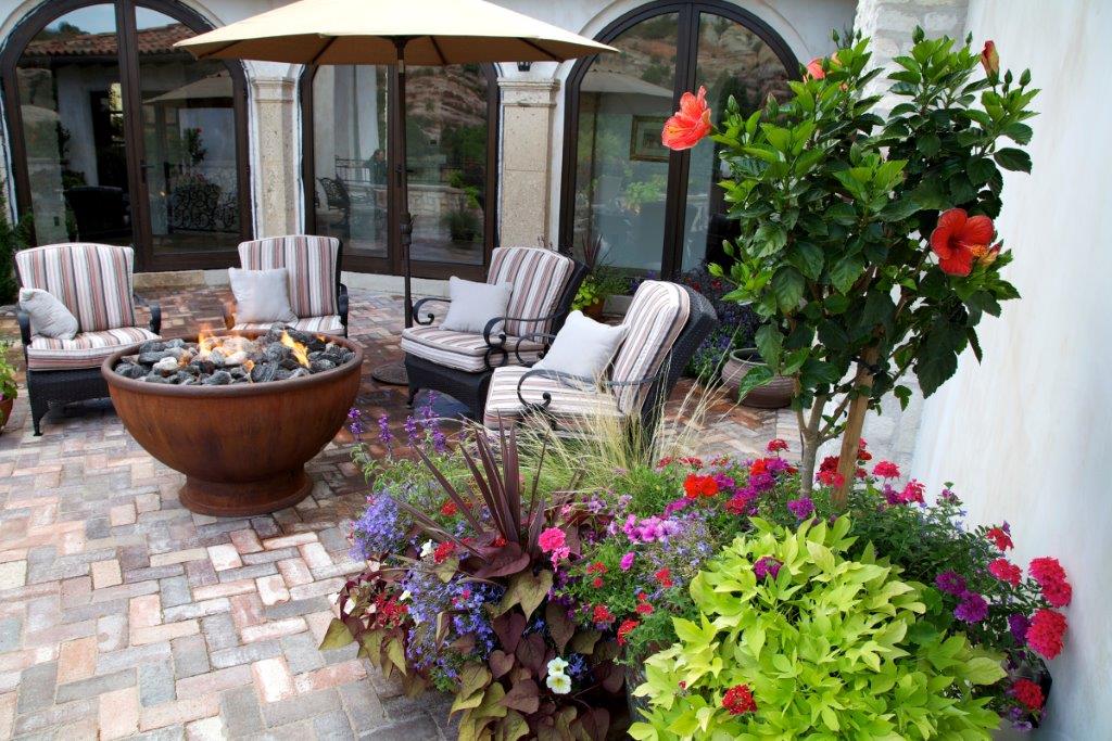 designs by sundown fire feature with colorful flowers.jpg